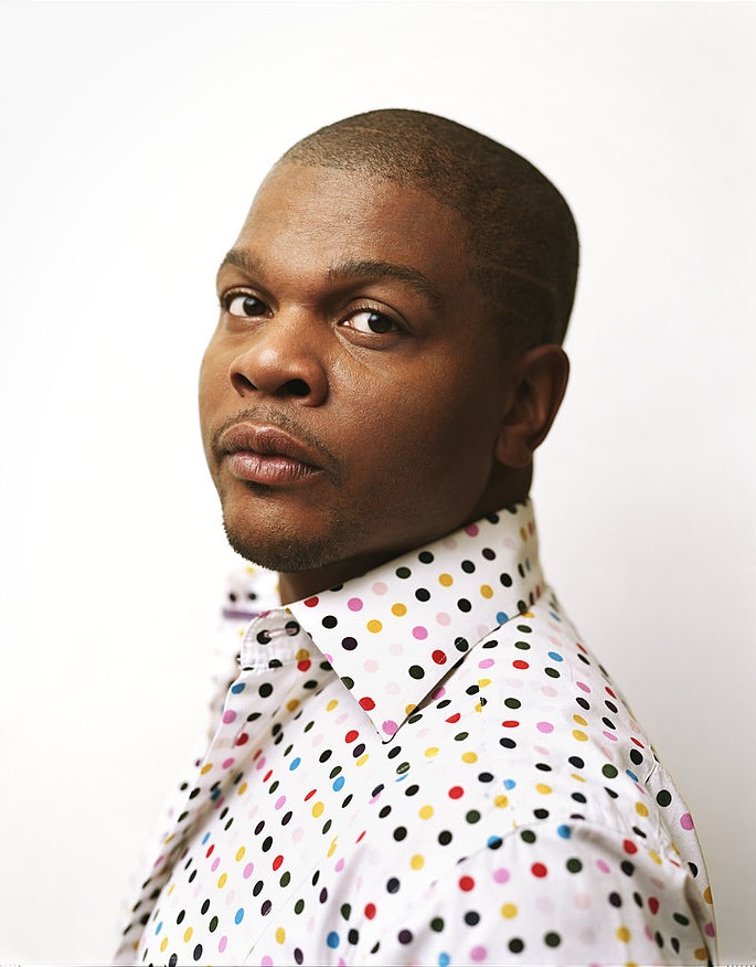 A headshot of Christian, showing a young man with short hair