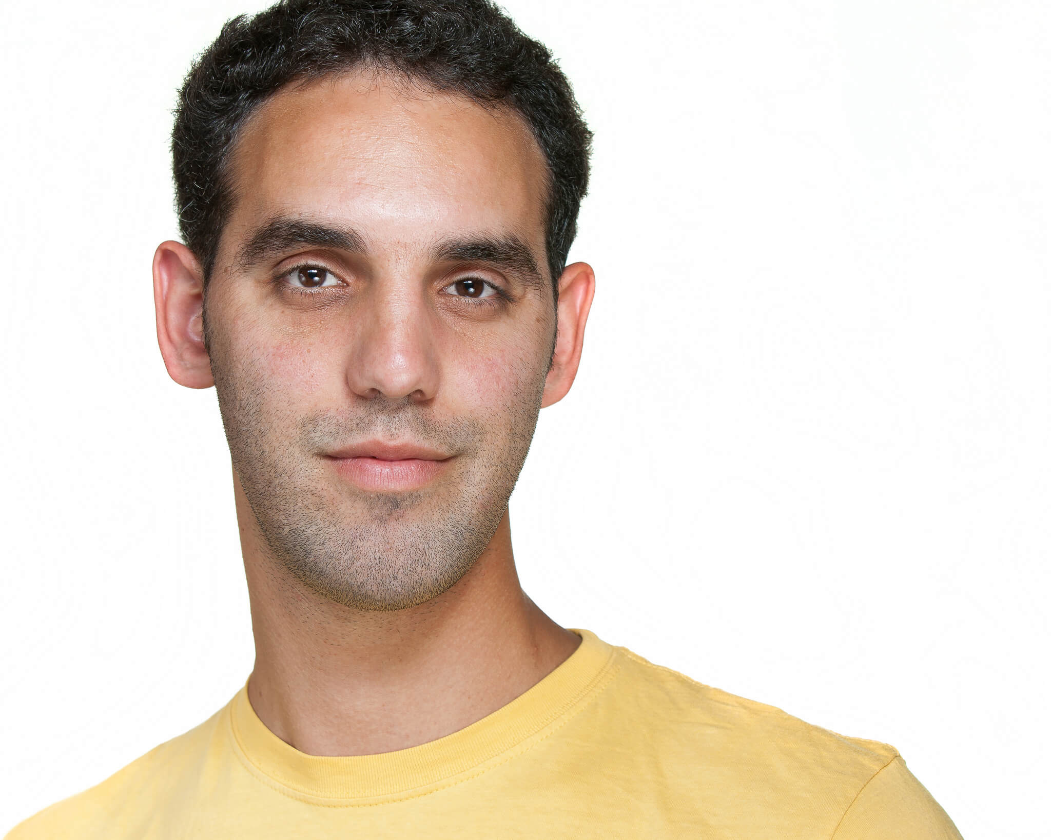 A headshot of Steve showing a young man with brown hair and brown eyes.