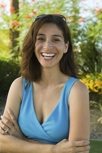 A headshot of Marisol, showing a mid-thirties woman with light brown hair.